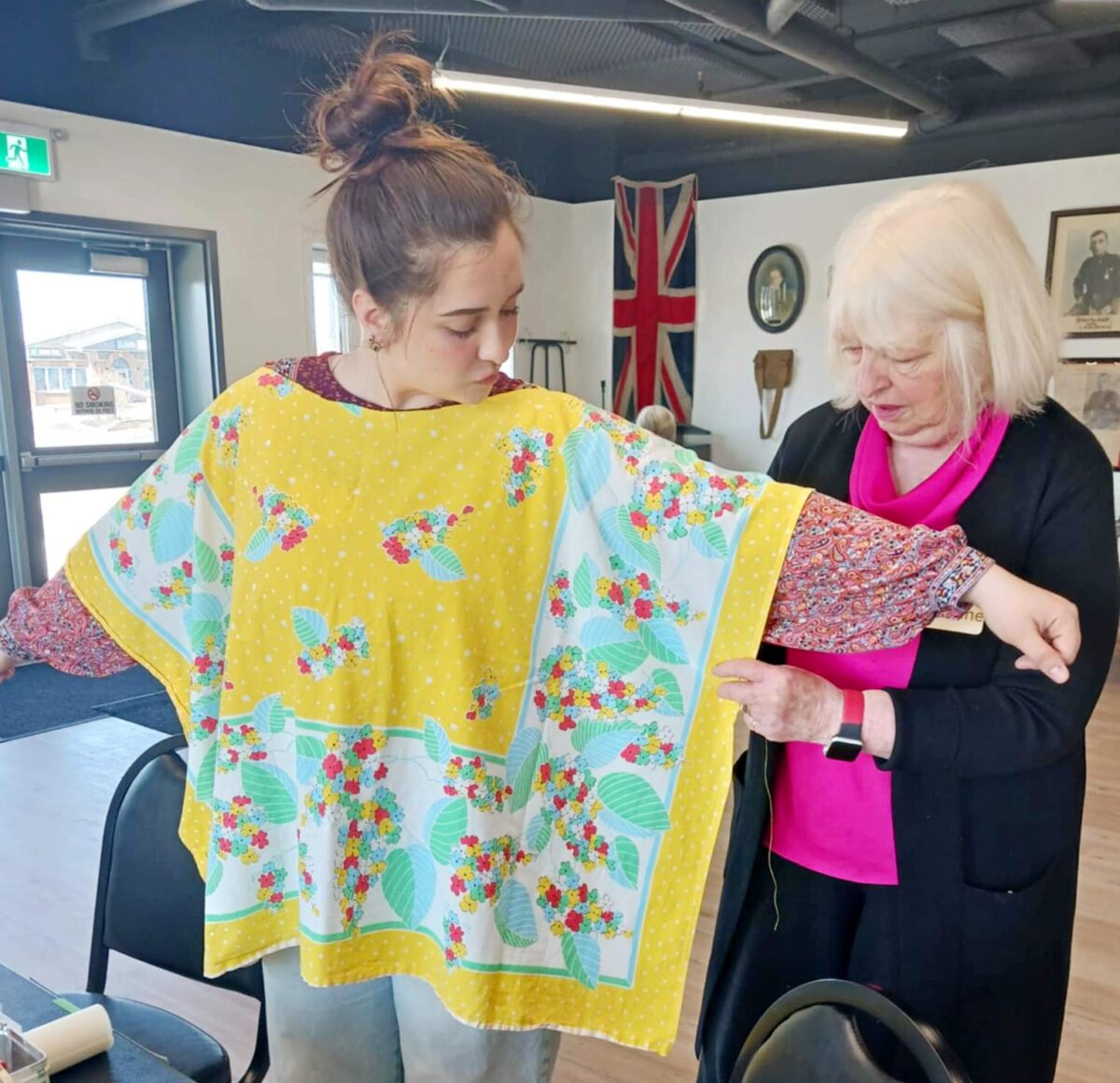 photo of sewing fixer with customer